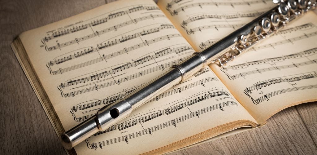 flute with music note book