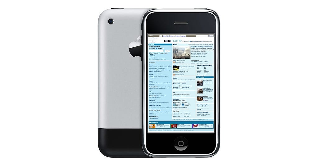 A first generation iPhone displaying the BBC homepage showing how the website does not respond to the size of the screen.