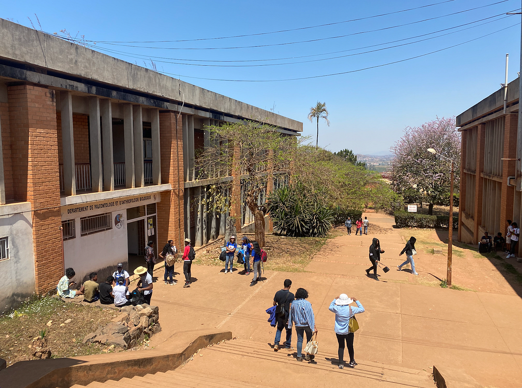 Students hanging out outside the department of Anthropobiology and Sustainable Development at the University of Antananarivo, Madagascar.