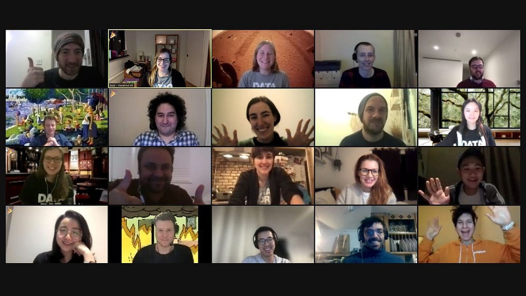 Screenshot of a Zoom video call with 20 casually dressed, smiling adults