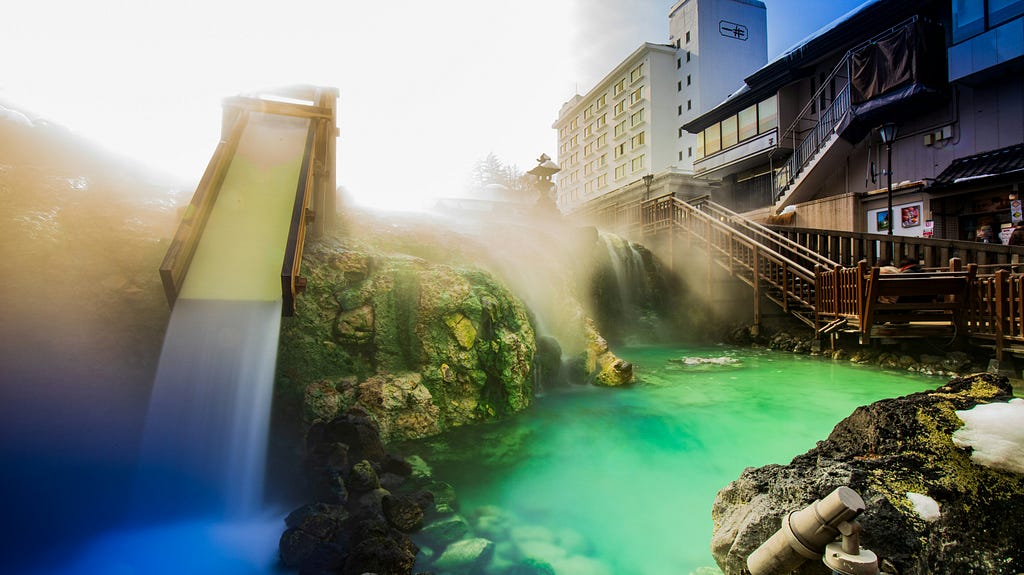 A green hot spring bath.