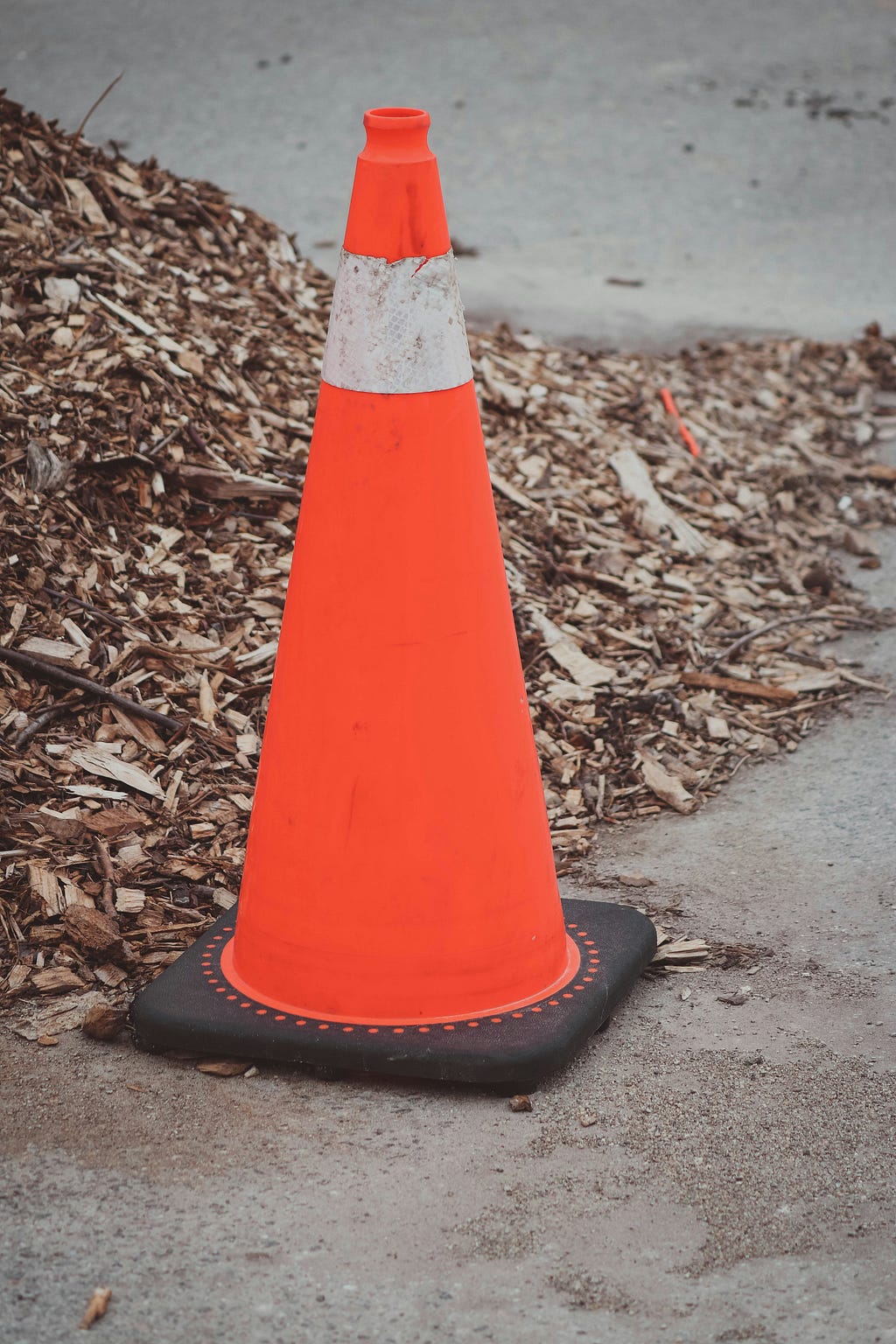 cone and also a traffic sign
