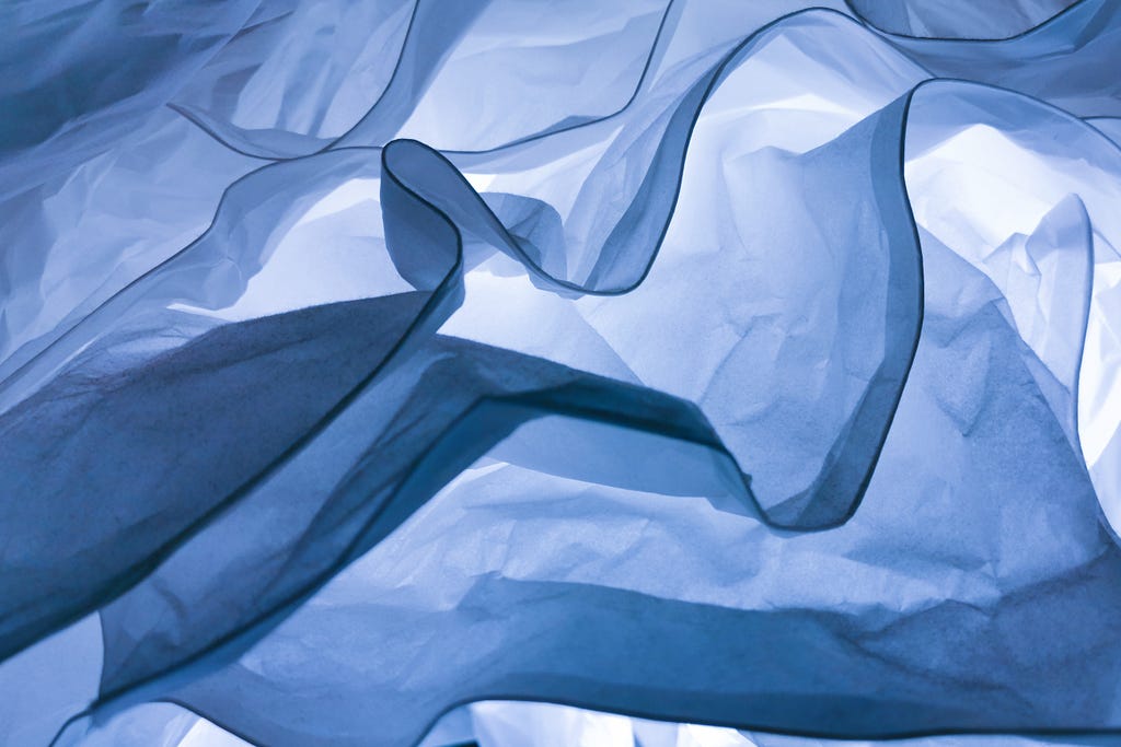 Billowing blue fabric in layers