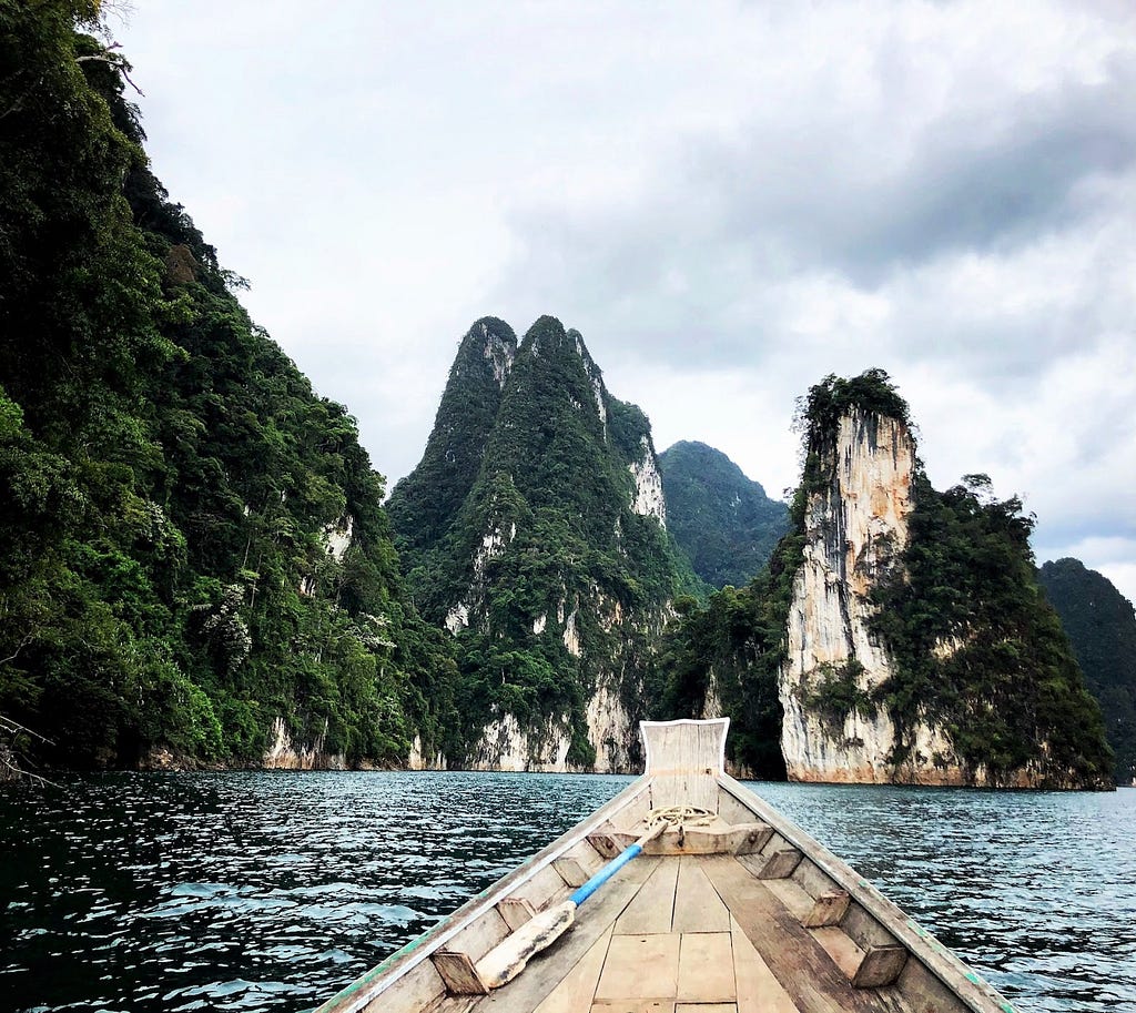 The view of rock formations from a boat.