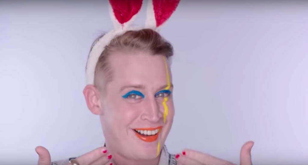 Macaulay Culkin wearing bunny ears