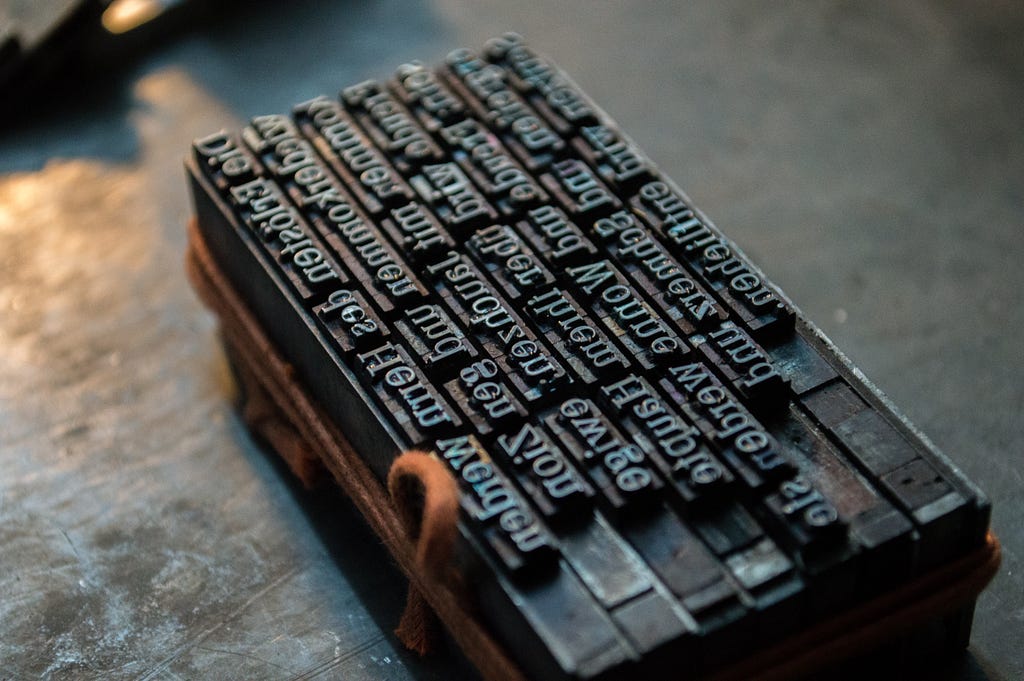 Letters on a printing press