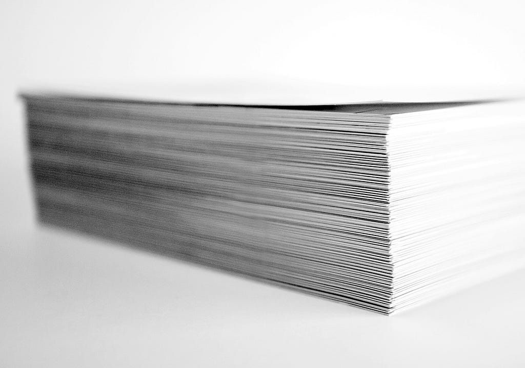 This may be a stock image, but believe it or not, the stack of resumes we had of graduates was, in fact, this large.