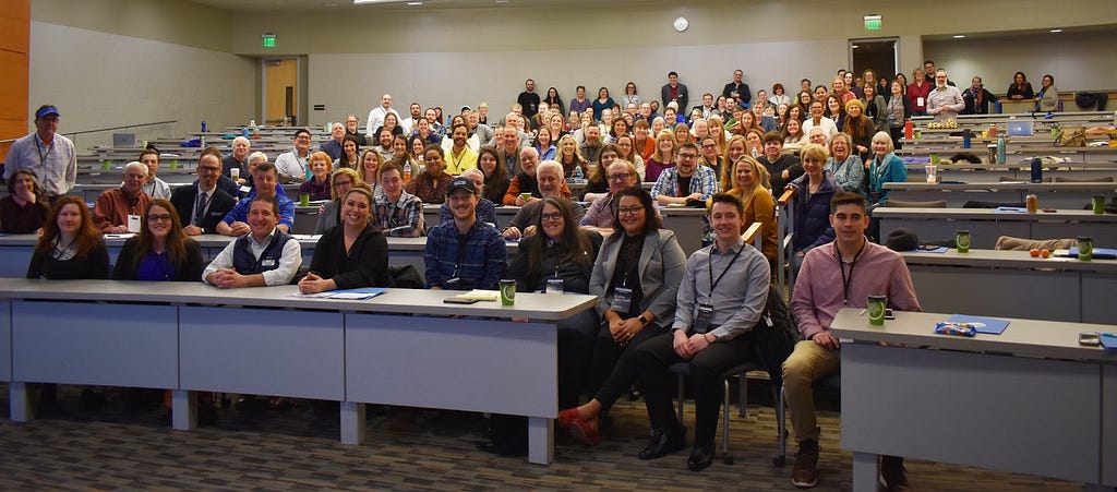 crowd of idaho democrats in a lecture hall