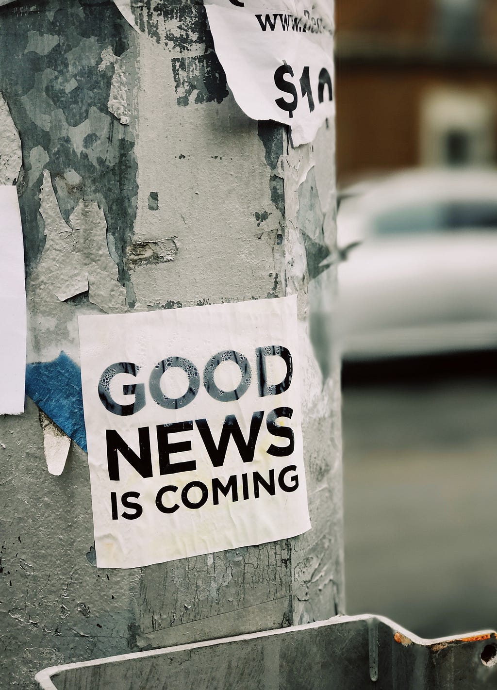 sign on poll saying, “good news is coming” to represent why people should sign up for a brand’s newsletter