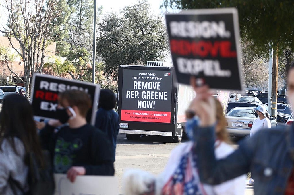 Protesters outside House Minority Leader Kevin McCarthy’s Bakersfield, California, office on February 4, demanding Greene’s removal from Congress.