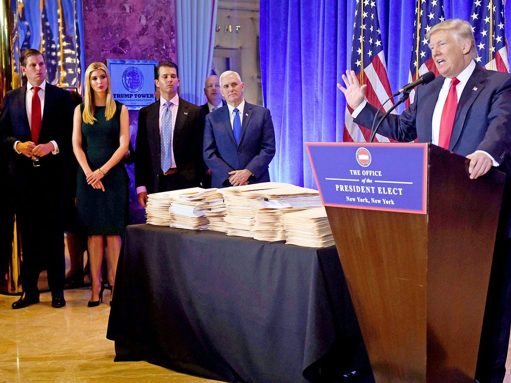 Eric Trump, Ivanka Trump, Donald Trump Jr, and Vice President-elect Mike Pence look on as President-elect Donald Trump conducts a press conference at Trump Tower in New York on January 11, 2017.