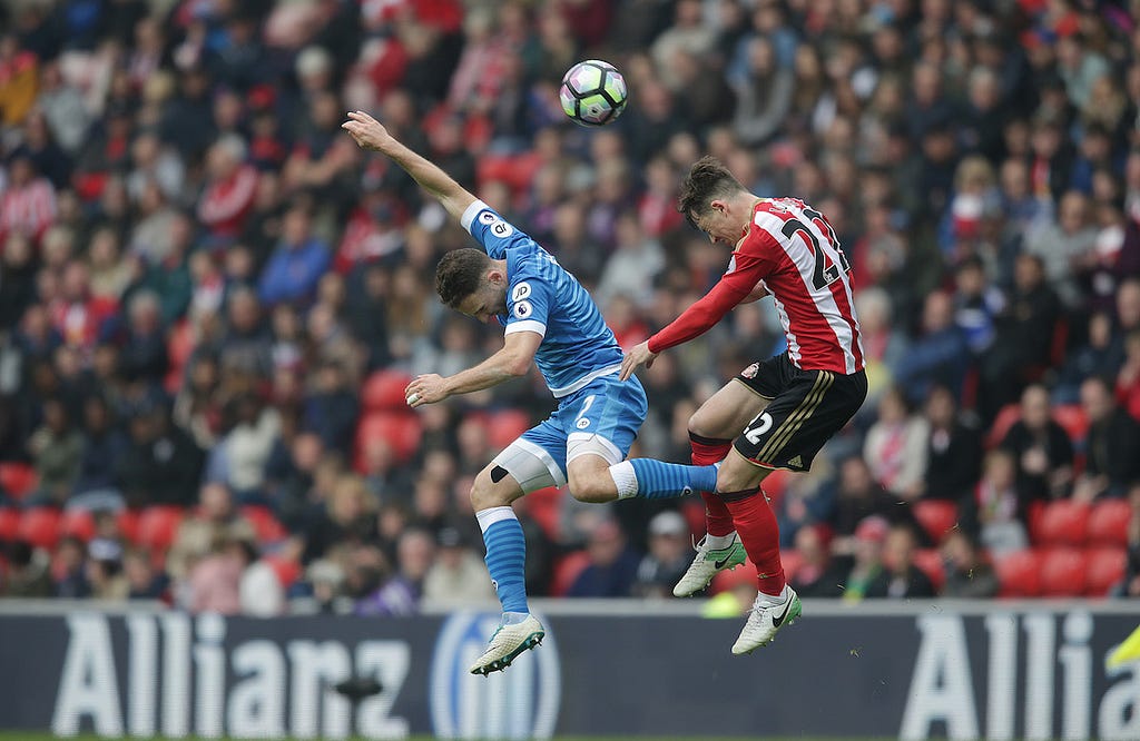 Marc Pugh of Bournemouth and Donald Love of Sunderland during the Premier League match between Sunderland and Bournemouth at the Stadium of Light, Sunderland on the 29th April 2017. Photo: Robin Jones