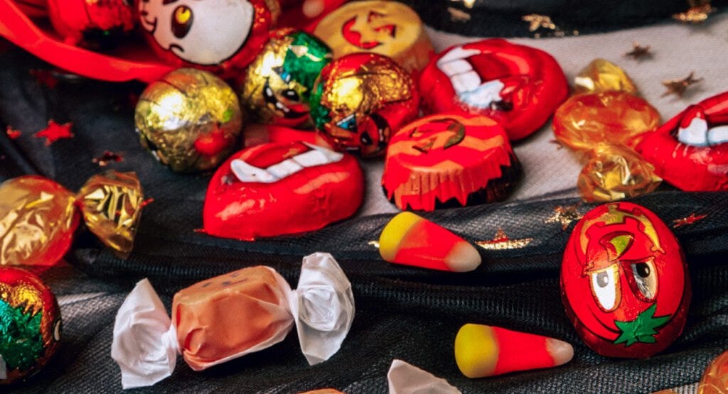 Candies wrapped in foil and wax paper