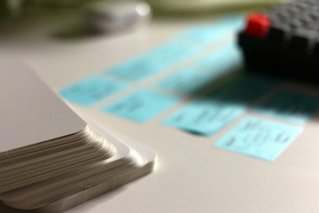 Sticky notes, keyboard, and flashcards