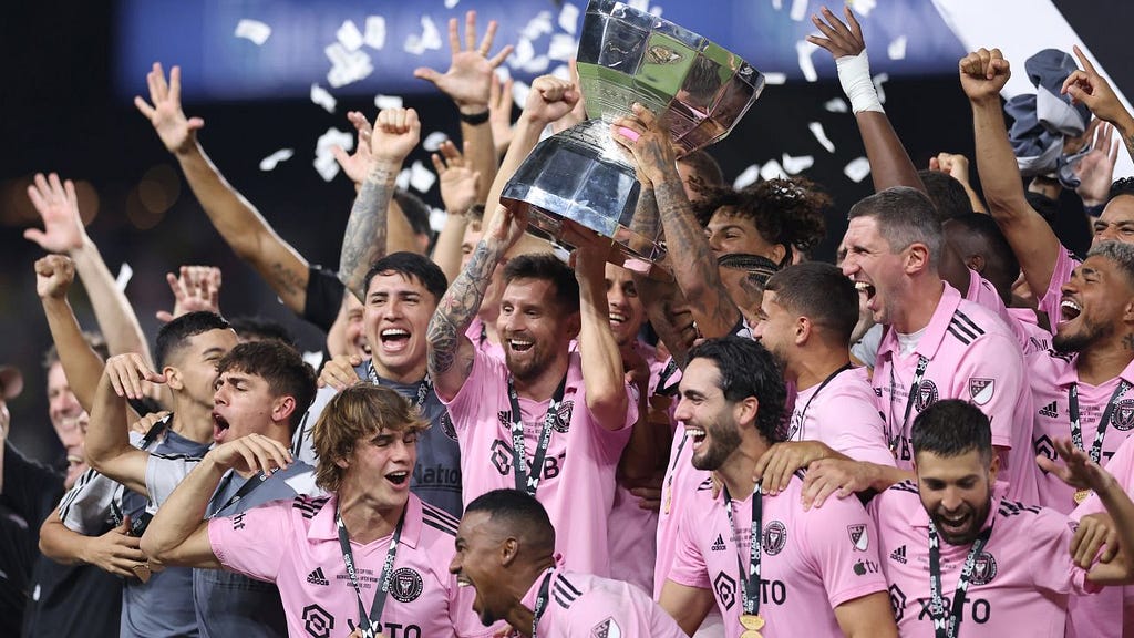 Lionel Messi of Inter Miami hoists the trophy with his teammates after defeating the Nashville SC to win the Leagues Cup 2023 final match at GEODIS Park in Nashville, Tennessee. (Tim Nwachukwu/Getty Images)