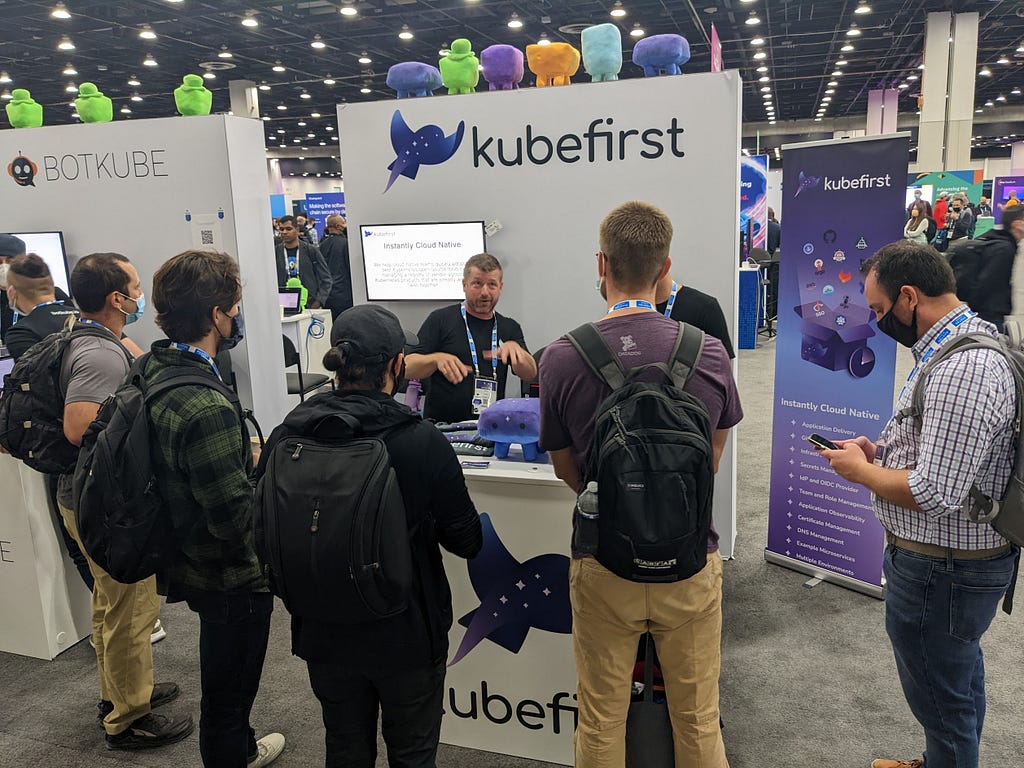 Kubefirst cofounders pitching their product on the kubecon floor