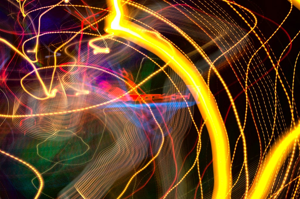 abstract pattern made with colored light trails