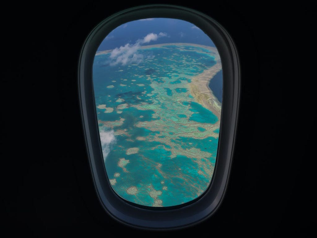 A Boeing 787 Dreamliner aircraft flies close to the Great Barrier Reef, Queensland on October 10, 2020.