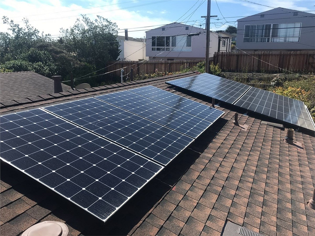 Top view of solar panels on the roof of the house