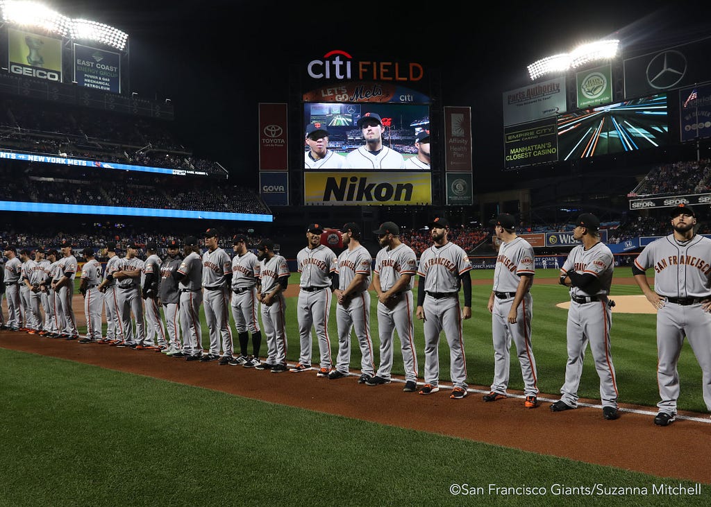 The team lines up during the pregame ceremony.