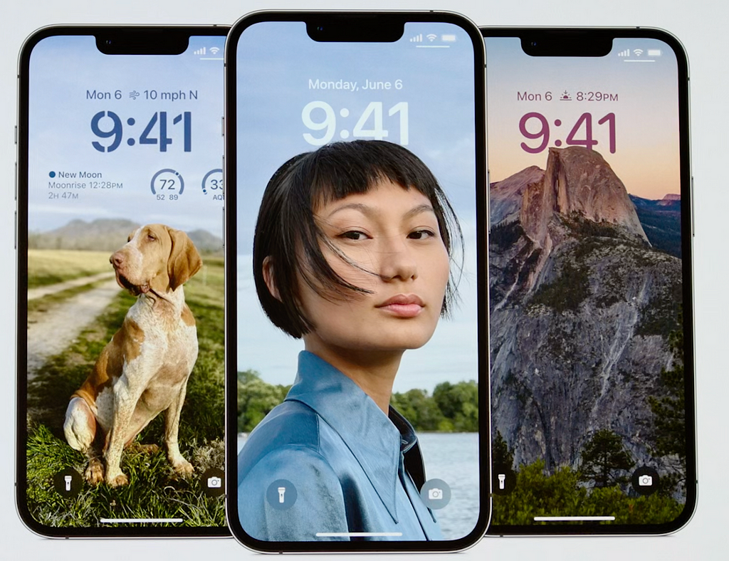 Multiple iOS 16 iPhones that show the new lock screens with the one on the left showing the new lock screen widget support.