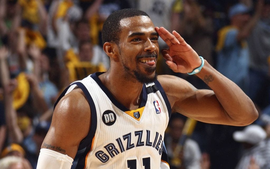 Memphis Grizzlies guard Mike Conley (11) celebrates a three-point basket against the Los Angeles Clippers during the second half of NBA basketball action in Memphis, Tennessee April 27, 2013. The Grizzlies defeated the Clippers 104-83. REUTERS/Nikki Boertman (UNITED STATES - Tags: SPORT BASKETBALL)