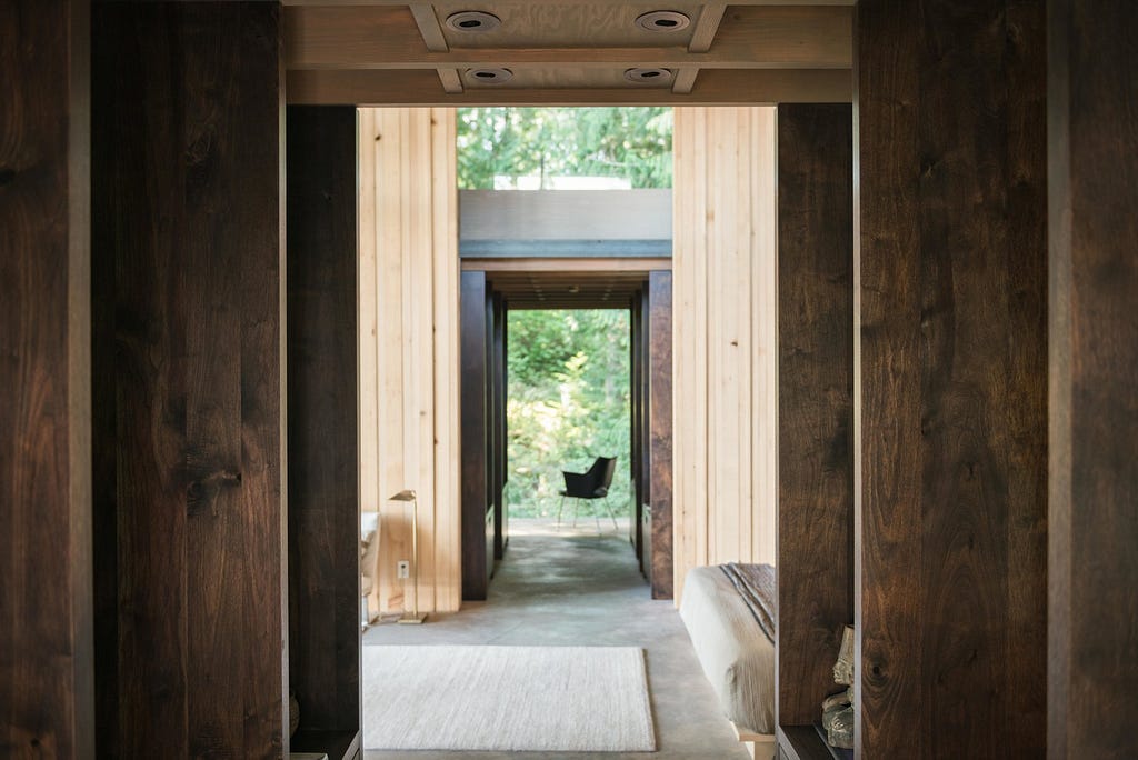 Hallway and Concrete Floor Interior spaces appear to flow seamlessly to the outside as materials continue from inside to out through invisible sheets of glass.&nbsp;