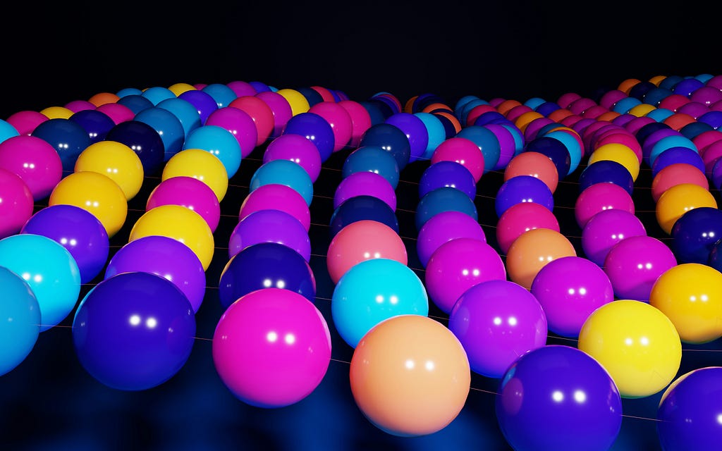 rows of coloured balls denoting atoms