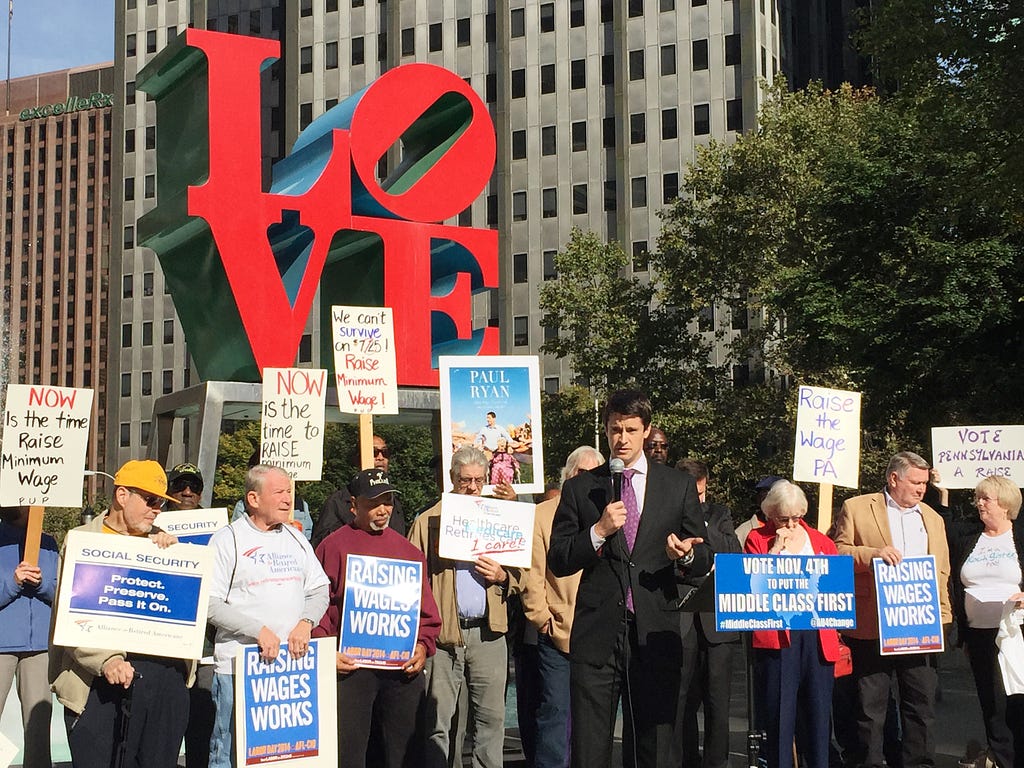 PHOTO COURTESY OF WILL BLOCK Kevin Strouse, Cemocratic candidate for Congress in Pennsylvania's 8th District, was a featured speaker at the Philadelphia stop of the Americans United for Change "Put the Middle Class First" bus tour last  Thursday.