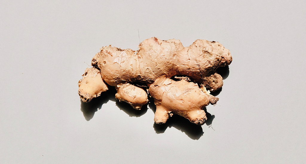 a piece of ginger on a beige background