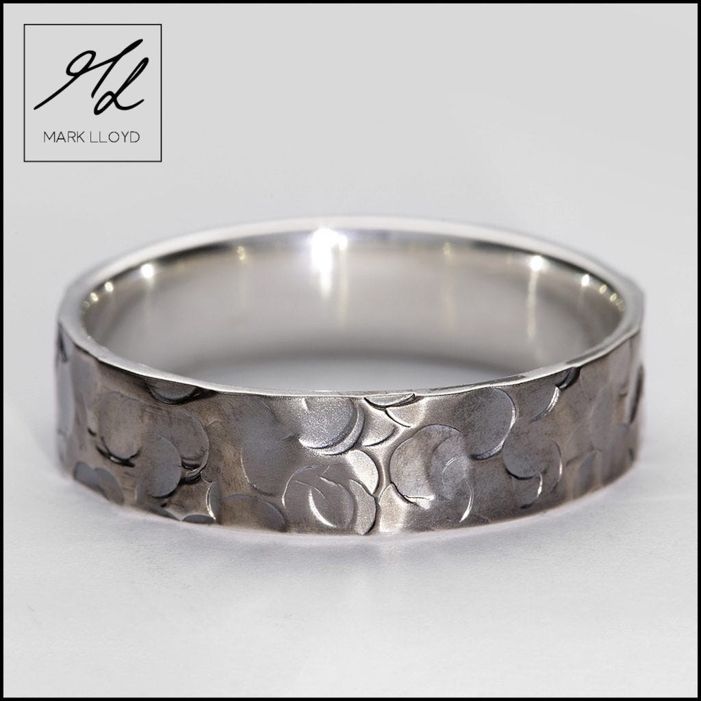 Picture of a wedding ring design called EROS in oxidised silver by Mark Lloyd Master Goldsmith