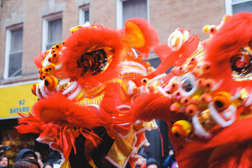 Lion dancers in Chinatown, Manhattan.