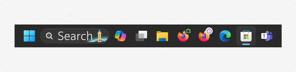 Windows taskbar showing two Firefox icons, one with a green suitcase icon in the upper right corner and one with a purple flower icon amongst other standard taskbar icons