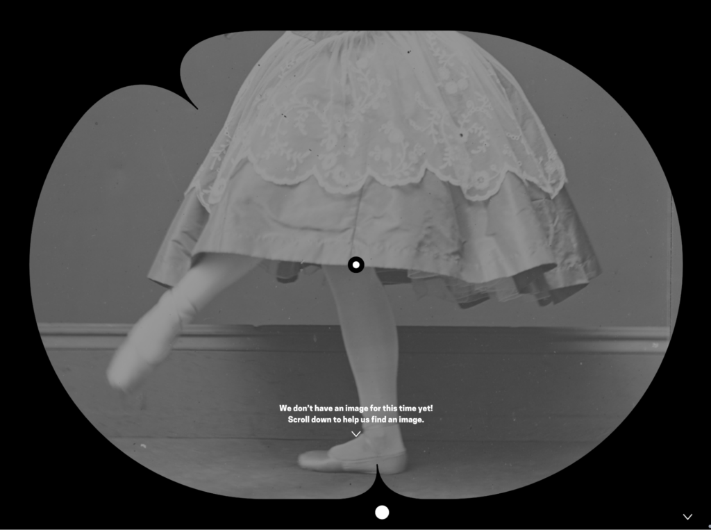 A black and white image of a ballerina in a full skirt and toe shoes, bordered by the black art clock frame. Towards the bottom of the image, white text reads” We don’t have an image for this time yet? Scroll down to help us find an image.”