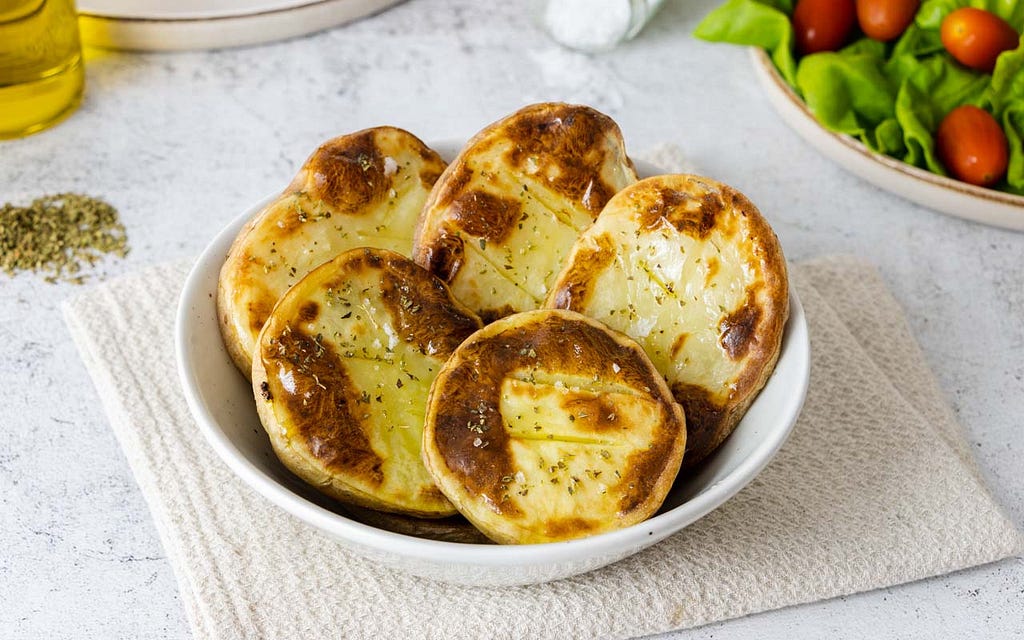 Oven-baked potatoes or Patates Oftes