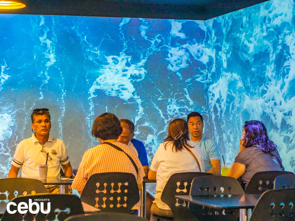 Chairs with the ocean background at Gangnam Cafe