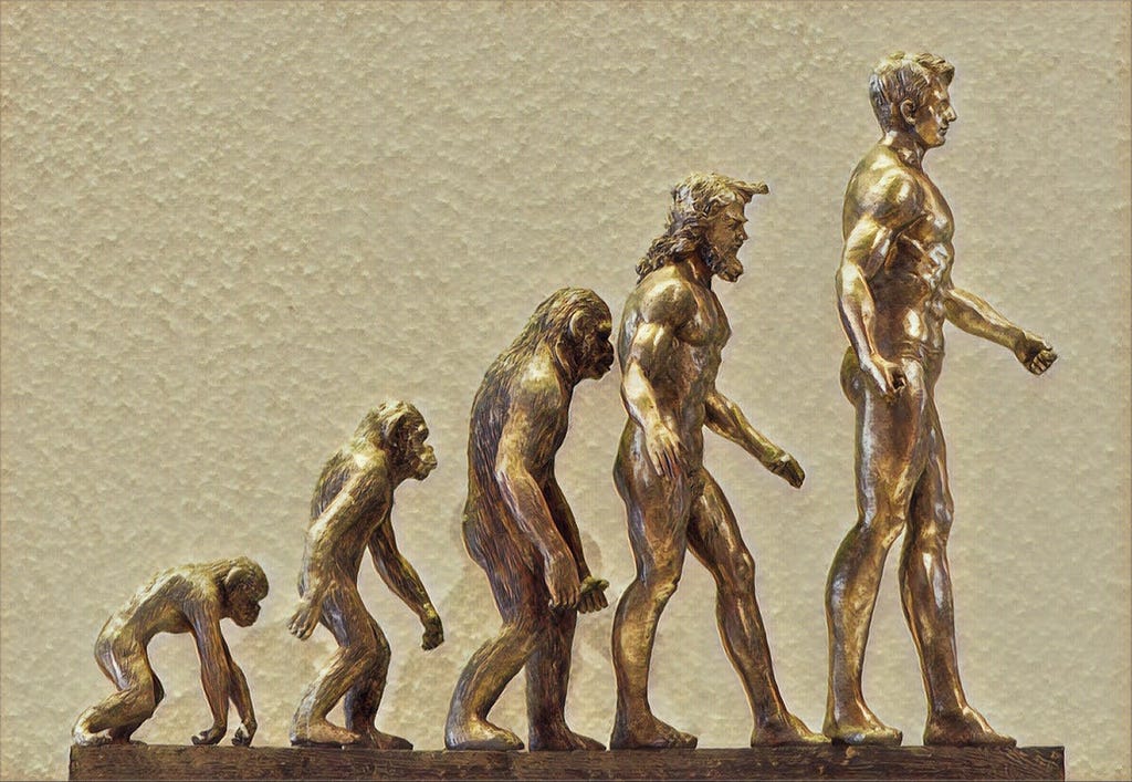 A statue depicting human evolution