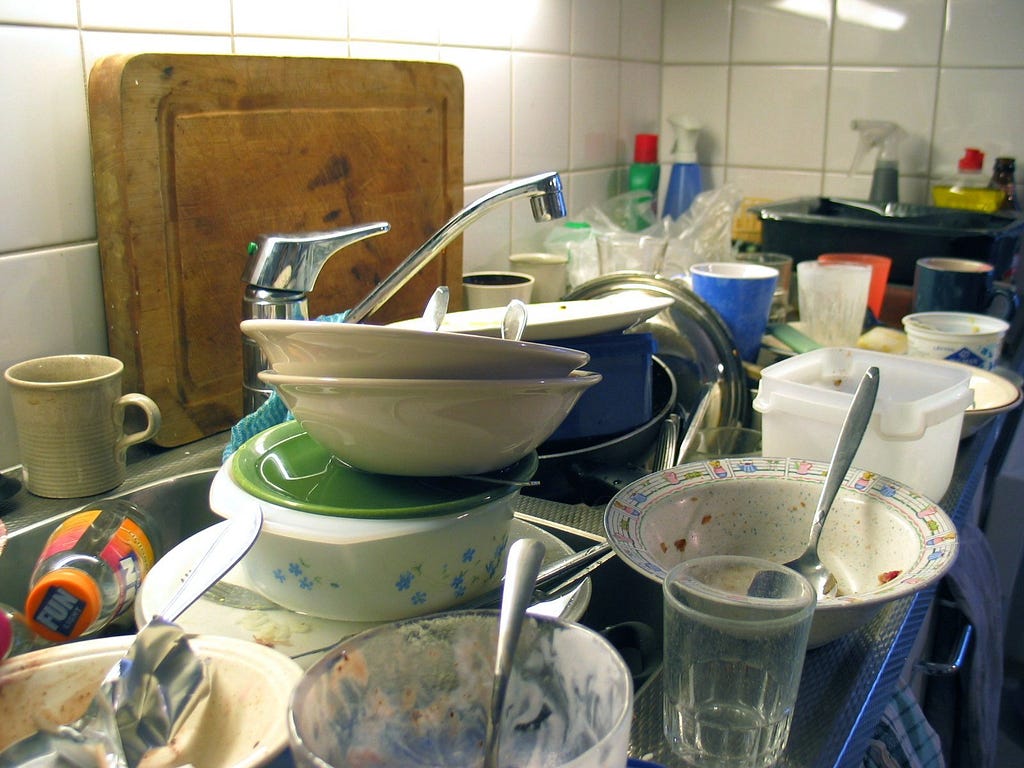 Sink of dirty dishes and spoons. Spoonies, save your spoons!