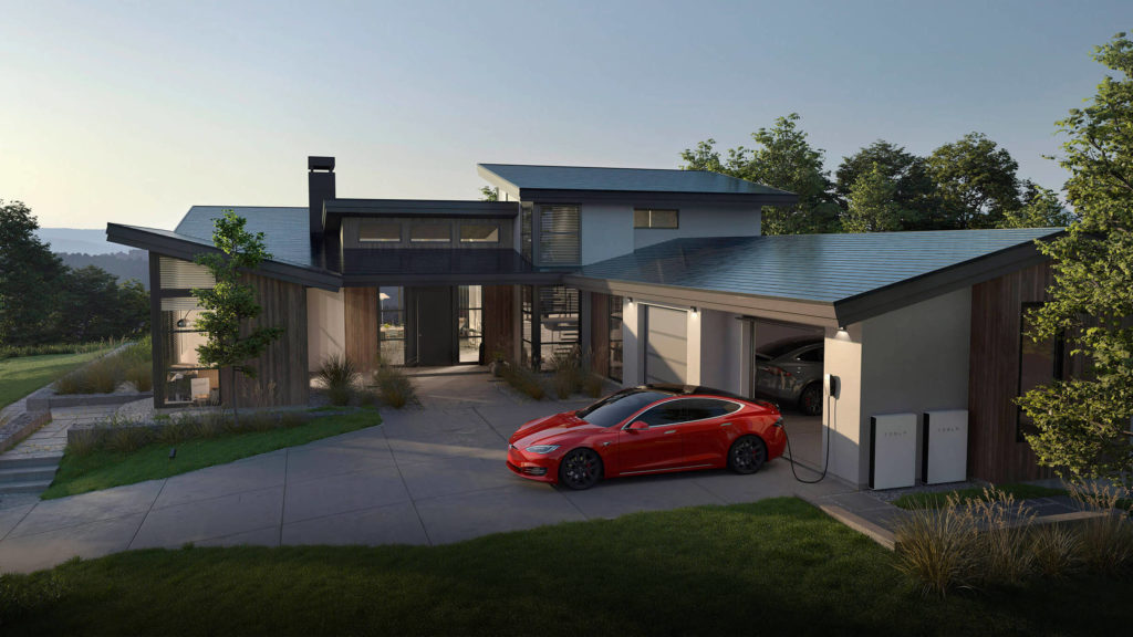 View of a car charging from a Tesla solar system that is placed on a beautiful modern building