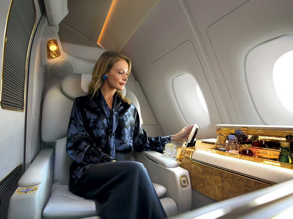 emirates first class with miles and points
