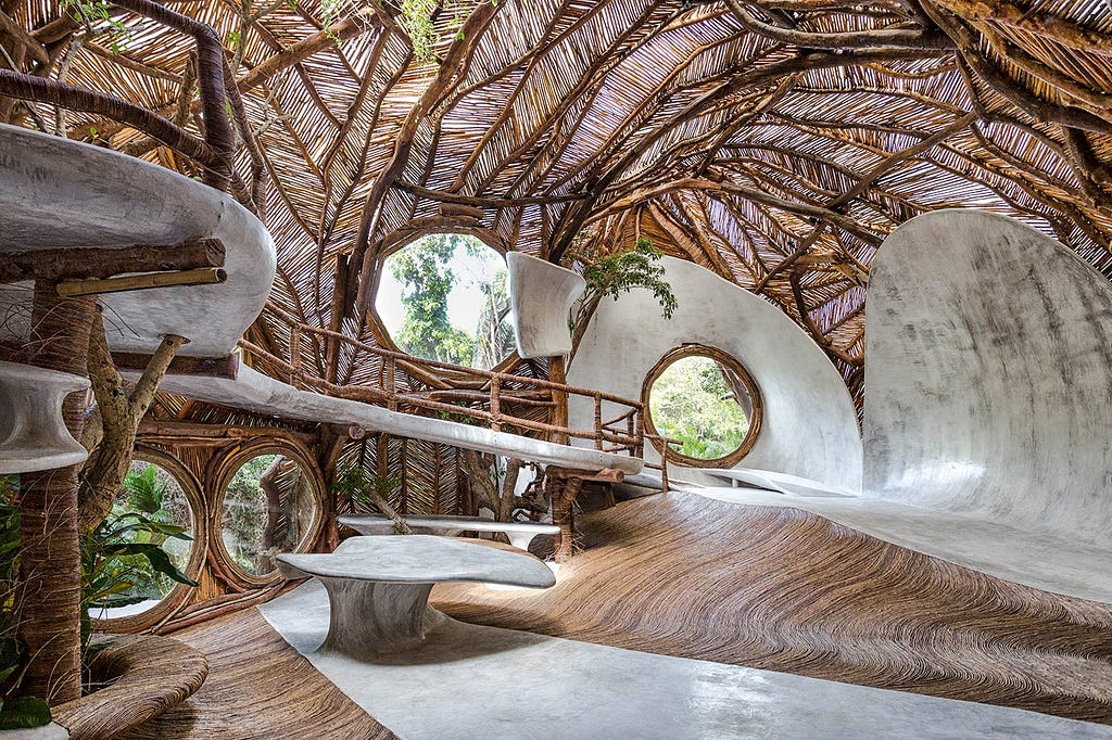 Art, nature, local materials, and traditional techniques coexist in this unconventional structure that resists the definition