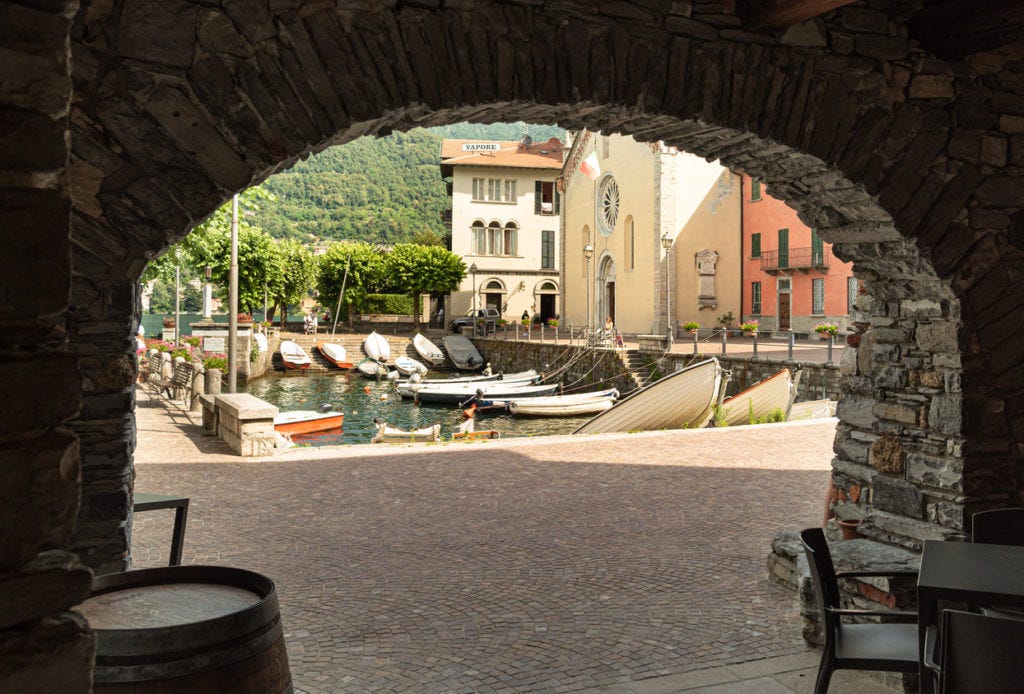 Central square of ancient village Torno overlooking Lake Como