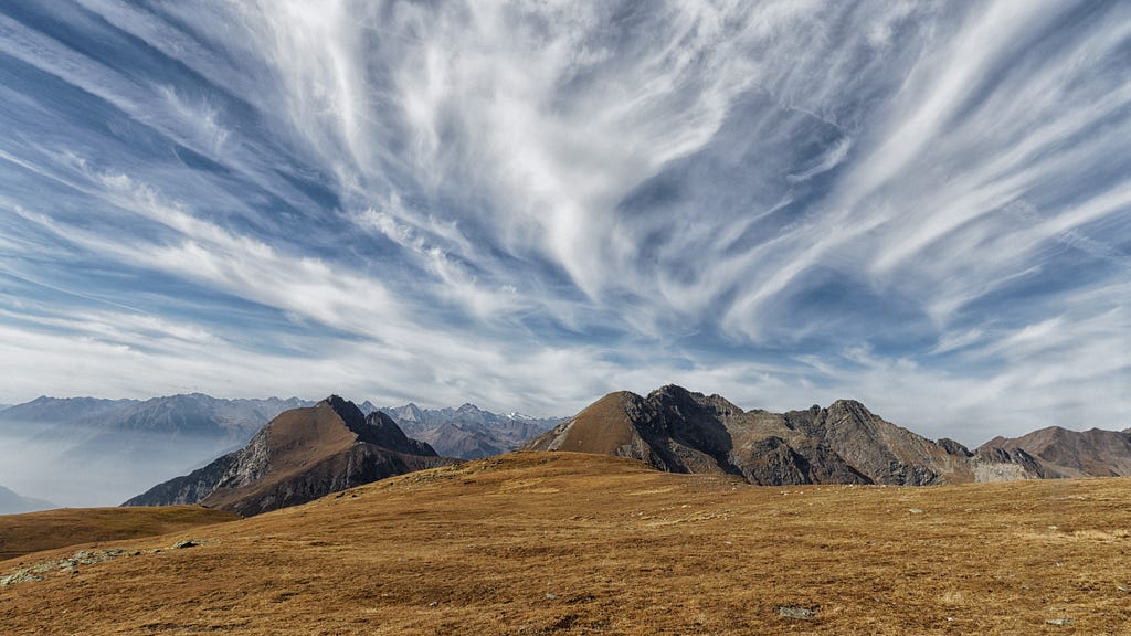 Cloudy sky over mountains.