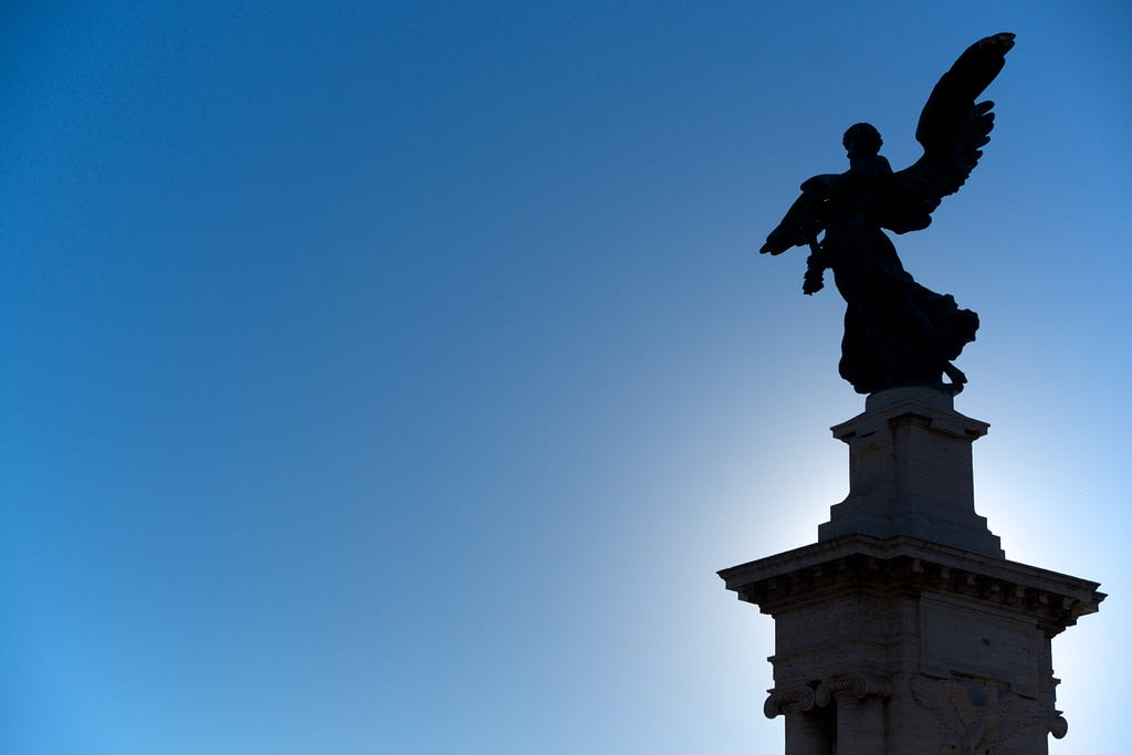 Statue on a bridge across the Tiber River