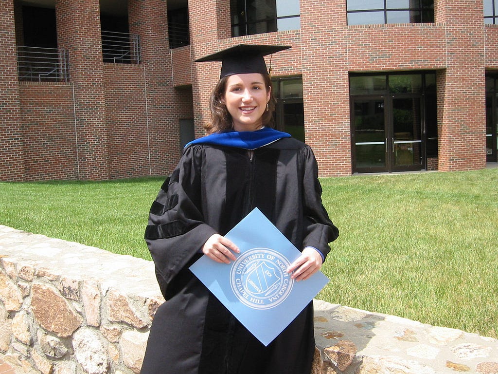 The newly minted Dr. Arnett in front of her lab at UNC-Chapel Hill’s Lineberger Comprehensive Cancer Center