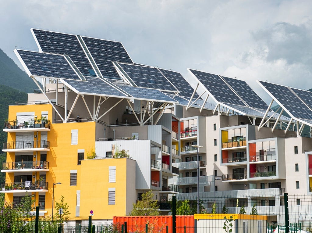 Buildings equipped with photovoltaic panels, storage batteries, rainwater and wastewater recovery systems welcomed the first inhabitants in 2020, in Grenoble, France. Photo by Joao Luiz Bulcao/Hans Lucas via Reuters