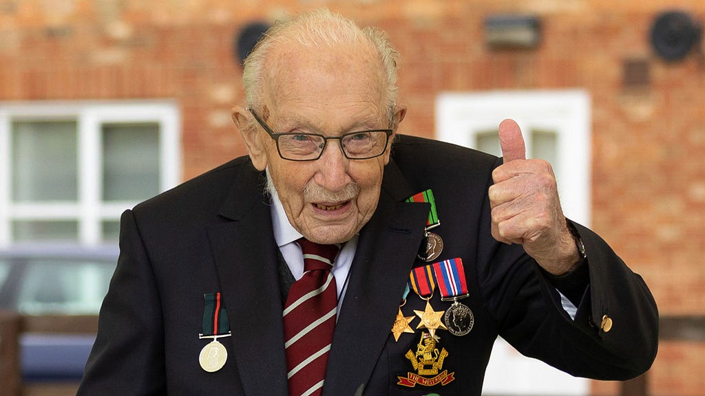 Captain Sir Tom Moore giving a thumbs up for the camera.