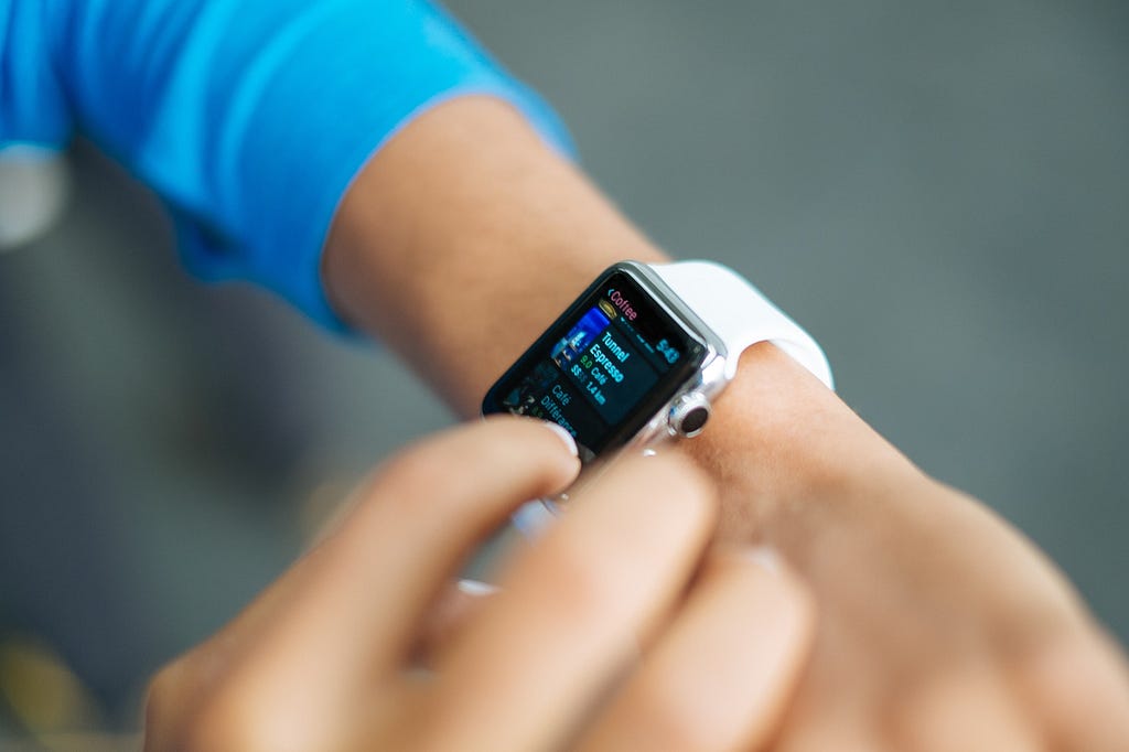 Close up of Person looking at locations on their apple watch // Photographer: Luke Chesser | Source: Unsplash