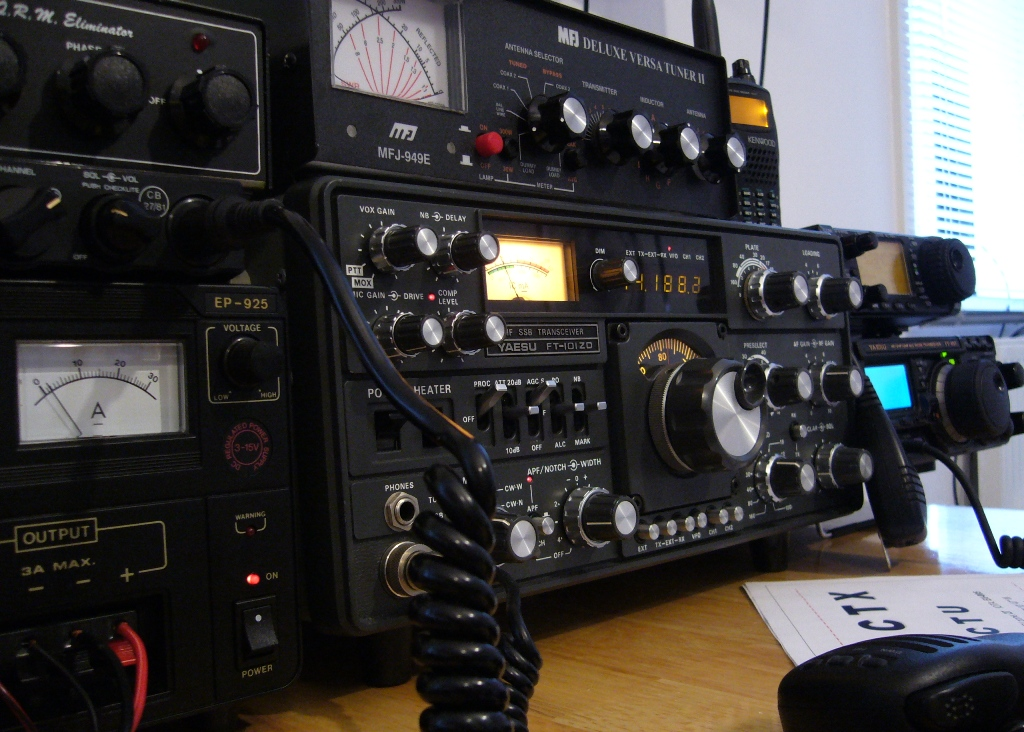 An amateur radio station setup on a bench