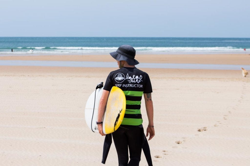Wear protective clothing when surfing to avoid sunburn